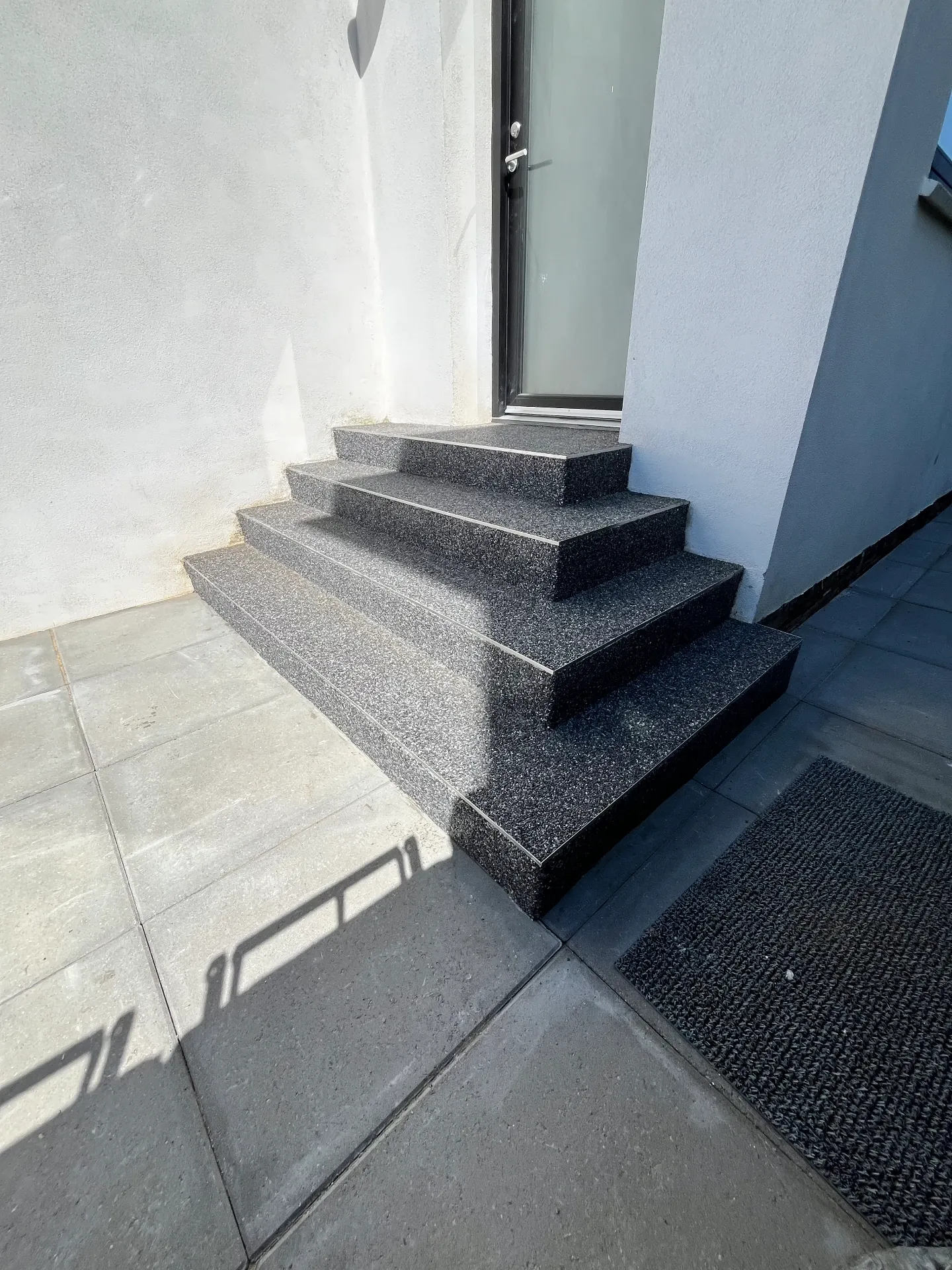 Renoveret udendørs trappe i StoneCarpet
